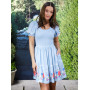 Peanuts Snoopy Floral Smock Dress - Import Août 2025 Peanuts Snoopy Floral Smock Dress - Import Août 2025